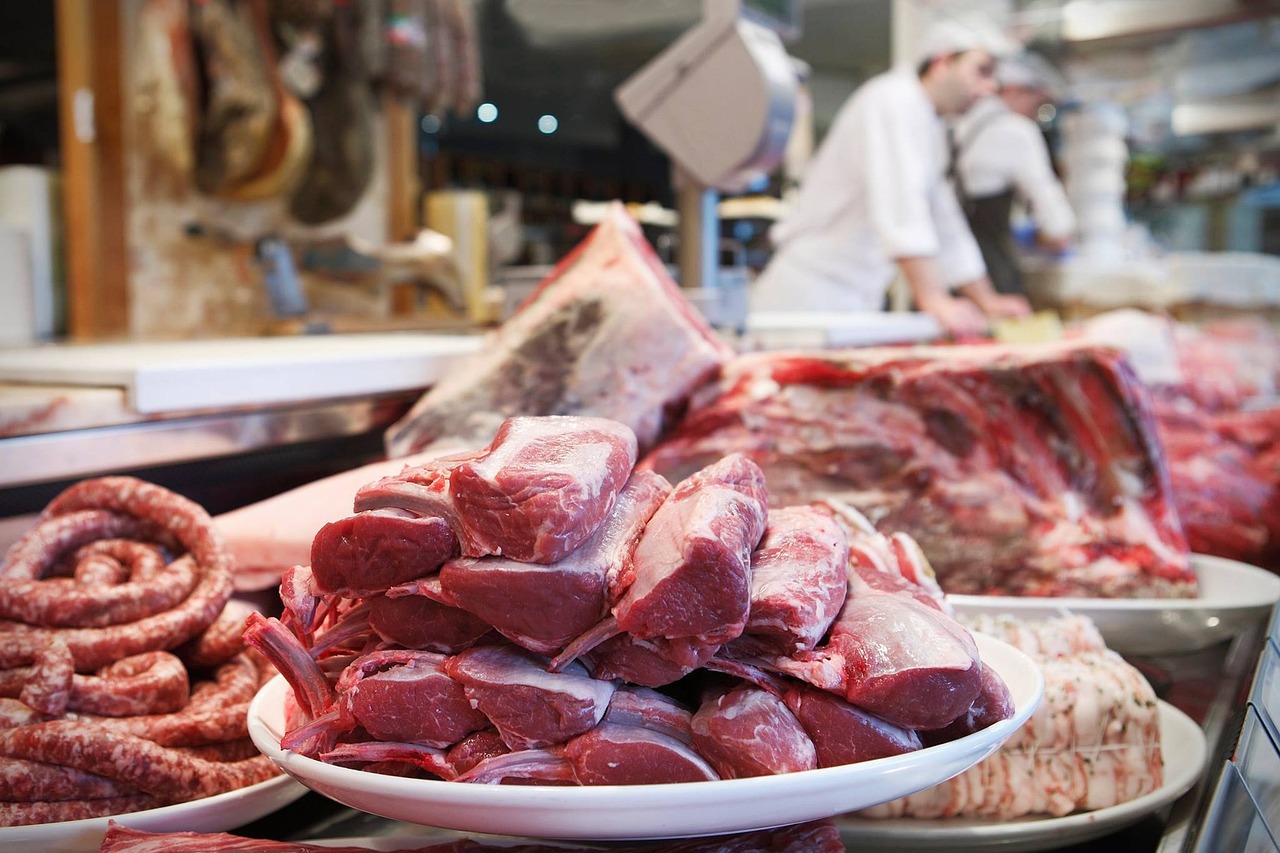 Raw sausage meat prepared for weighing and seasoning